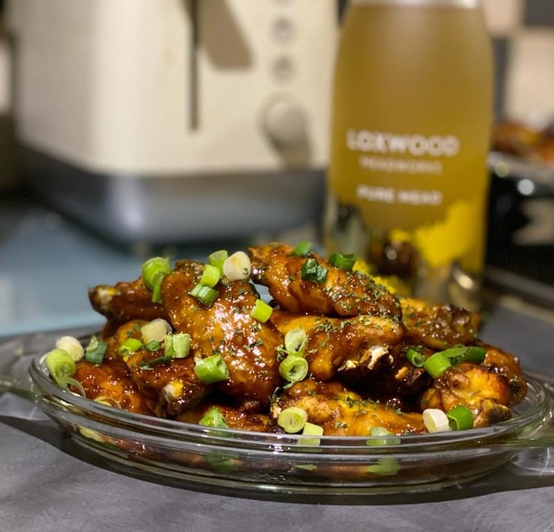 Honey Mustard and mead glazed chicken wings recipe made with loxwood meadworks