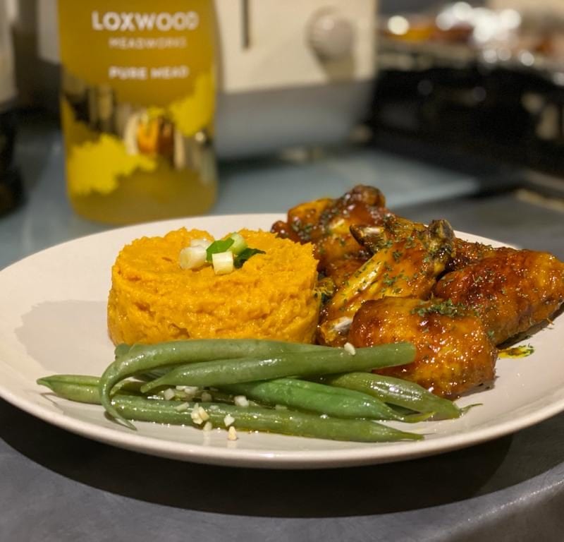 Honey Mustard and mead glazed chicken wings recipe made with loxwood meadworks